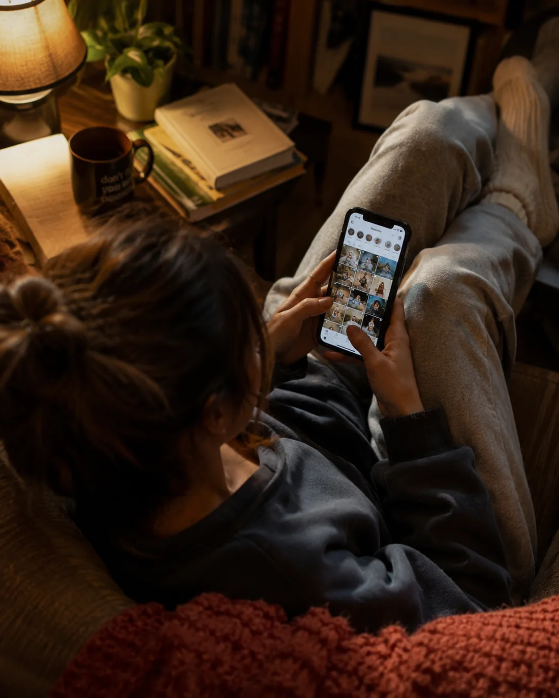 Sunk into the sofa, scrolling the feed while the morning waits